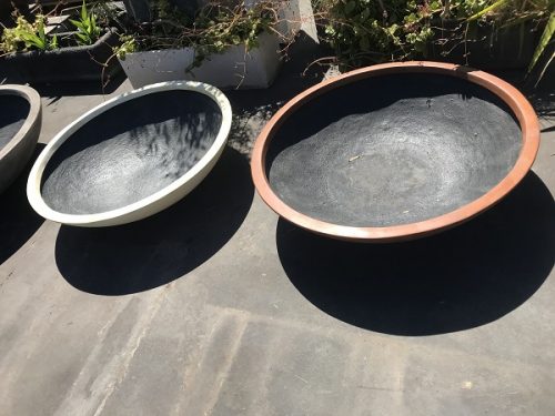 Two Low Garden Bowls, one in rust and one in slate.