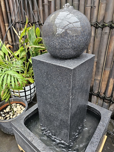 Ball on column water feature terrazzo